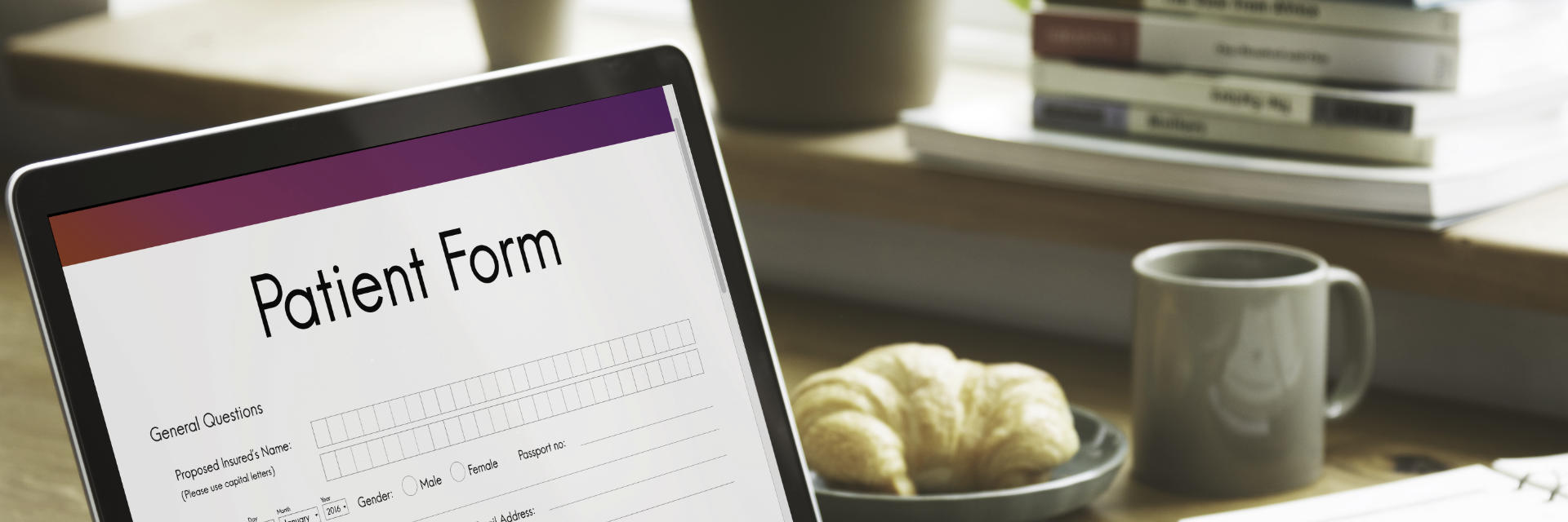 E-patient form displayed on a laptop screen.