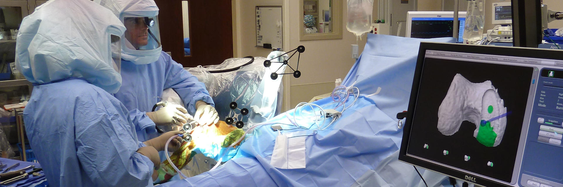 Dr. Buechel performing robotic knee replacement surgery