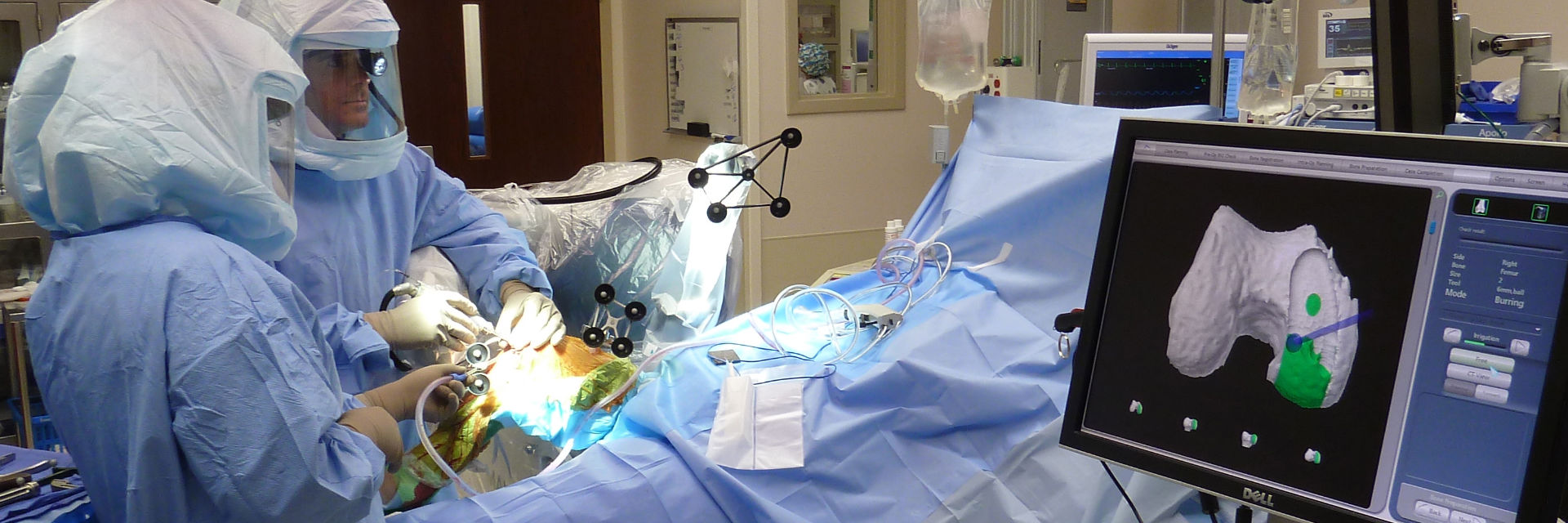 Dr. Buechel performing robotic knee replacement surgery